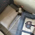 Di -